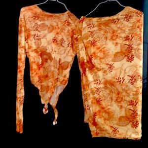 Two piece long sleeve mesh bodysuit and midi skirt